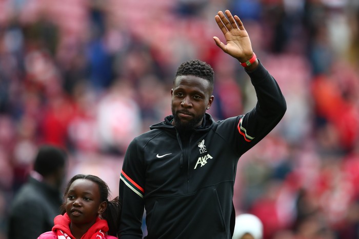    Divock Origi of Liverpool waves at the end of the Premier League match between Liverpool and Wolverhampton Wanderers at Anfield on May 22, 2022 in Liverpool, United Kingdom. (Photo by Chris Brunskill/Fantasista/Getty Images)