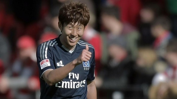 Hamburgs Heung-Min Son celebrates his 2-0 goal during the German Bundesliga soccer match between 1. FSV Mainz 05 and Hamburger SV at Coface Arena in Mainz, Germany, 13 April 2013. Photo: FREDRIK VON ERICHSEN (ATTENTION: EMBARGO CONDITIONS! The DFL permits the further utilisation of up to 15 pictures only (no sequntial pictures or video-similar series of pictures allowed) via the internet and online media during the match (including halftime), taken from inside the stadium and/or prior to the start of the match. The DFL permits the unrestricted transmission of digitised recordings during the match exclusively for internal editorial processing only (e.g. via picture picture databases) | usage worldwide   (Photo by Fredrik von Erichsen/picture alliance via Getty Images)