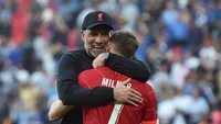 Milner memang sulit menembus skuad utama Liverpool sejak dua-tiga musim terakhir. Namun bagi manajer Juergen Klopp, kehadiran Milner adalah panutan bagi pemain lain (Getty Images)