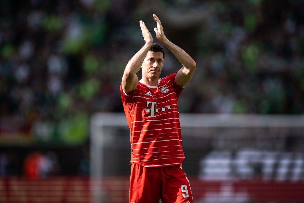 WOLFSBURG, GERMANY - MAY 14: Robert Lewandowski of Munich shows appreciation to the fans after the Bundesliga match between VfL Wolfsburg and FC Bayern München at Volkswagen Arena on May 14, 2022 in Wolfsburg, Germany. (Photo by Marvin Ibo Guengoer - GES Sportfoto/Getty Images)