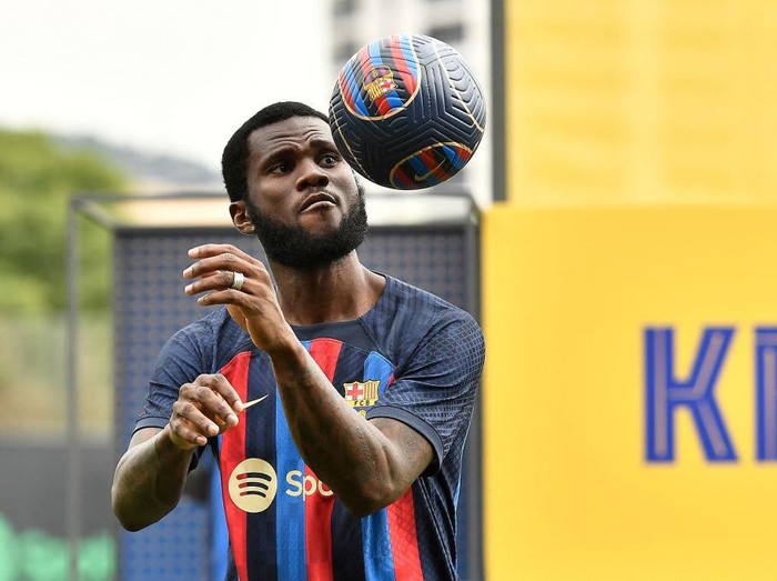 FC Barcelona's new Ivorian midfielder Franck Kessie poses for pictures during his presentation ceremony at the Joan Gamper training ground in Sant Joan Despi, near Barcelona on July 6, 2022. (Photo by Pau BARRENA / AFP) (Photo by PAU BARRENA/AFP via Getty Images)
