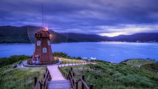 Geoje windy hill windmill taken right after sunset. Famous travel landmark in Geoje-si, South Korea