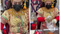 Penjual Ayam Goreng Nyentrik Ini Jadi Pusat Perhatian Turis