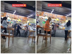Ambil Makanan dengan Gaya Bela Diri, Wanita Ini Kagetkan Pelanggan Lain