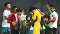 Pemain Indonesia tertunduk lesu meski menang. (Foto: ANTARA FOTO/Akbar Nugroho Gumay)