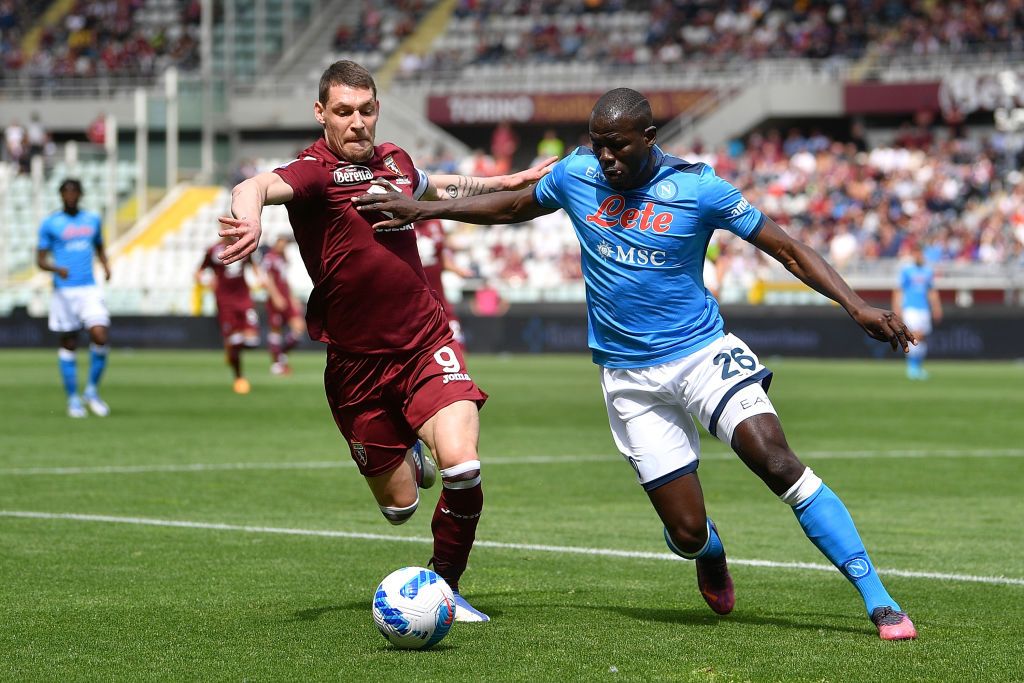 TURIN, ITALY - MAY 07:  Andrea Belotti of Torino FC is challenged by Kalidou Koulibaly of SSC Napoli during the Serie A match between Torino FC and SSC Napoli at Stadio Olimpico di Torino on May 7, 2022 in Turin, Italy.  (Photo by Valerio Pennicino/Getty Images)