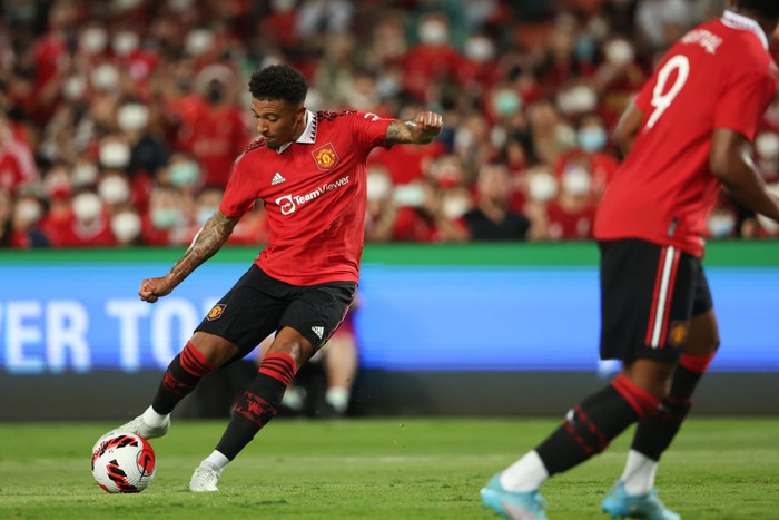 BANGKOK, THAILAND - JULY 12:  Jadon Sancho of Manchester United scores a goal to make it 1-0 during the preseason friendly match between Liverpool and Manchester United at Rajamangala Stadium on July 12, 2022 in Bangkok, Thailand. (Photo by Matthew Ashton - AMA/Getty Images)
