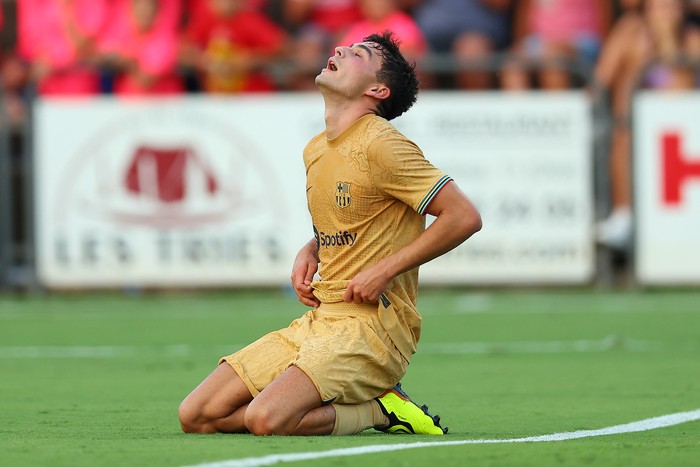 Barcelona OLOT, SPAIN - JULY 13: Pedro 'Pedri' Gonzalez of FC Barcelona reacts during the pre-season friendly match between UE Olot and FC Barcelona at Nou Estadi Municipal on July 13, 2022 in Olot, Spain. (Photo by Eric Alonso/Getty Images)