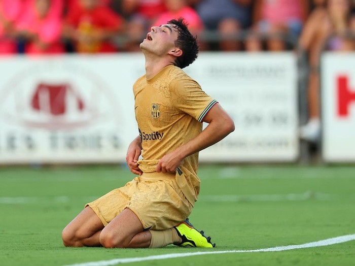 OLOT, SPAIN - JULY 13: Pedro 'Pedri' Gonzalez  of FC Barcelona reacts during the pre-season friendly match between UE Olot and FC Barcelona at Nou Estadi Municipal on July 13, 2022 in Olot, Spain. (Photo by Eric Alonso/Getty Images)