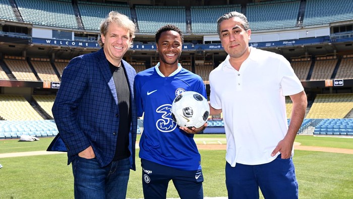 LOS ANGELES, CA - JULY 13: New Signing Raheem Sterling of Chelsea with Chelsea Co Owners Todd Boehly and Behdad Eghbali during a visit to Dodger Stadium on July 13, 2022 in Los Angeles, California. (Photo by Darren Walsh/Chelsea FC via Getty Images)