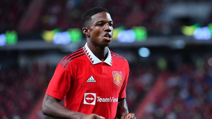 Tyrell Malacia BANGKOK, THAILAND - JULY 12: Tyrell Malacia #12 of Manchester UnitedΒ in action during the preseason friendly match between Liverpool and Manchester United at Rajamangala Stadium on July 12, 2022 in Bangkok, Thailand. (Photo by Supakit Wisetanuphong/MB Media/Getty Images)