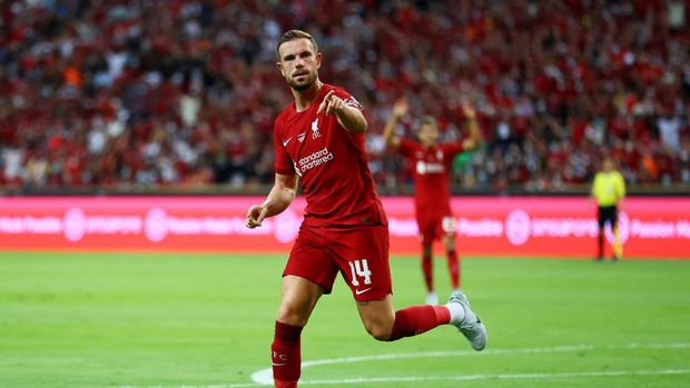 SINGAPORE, SINGAPORE - JULY 15: Jordan Henderson #14 of Liverpool celebrates after scoring his team's first goal against Crystal Palace during the first half of their preseason friendly at the National Stadium on July 15, 2022 in Singapore. (Photo by Yong Teck Lim/Getty Images)