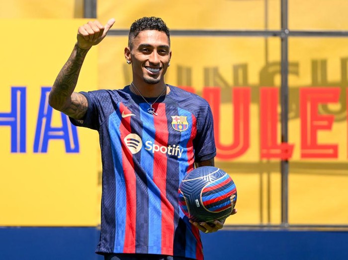 SANT JOAN DESPI, SPAIN - JULY 15: Raphael Dias Belloli 'Raphinha' poses for the media as he is presented as a FC Barcelona player at Ciutat Esportiva Joan Gamper on July 15, 2022 in Sant Joan Despi, Spain. (Photo by David Ramos/Getty Images)