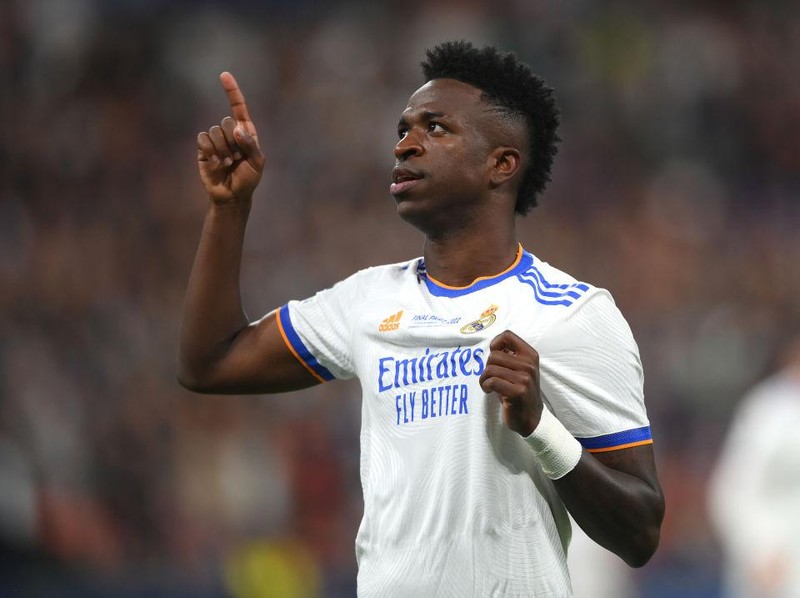 PARIS, FRANCE - MAY 28:  Vinicius Junior of Real Madrid celebrates after scoring their sides first goal during the UEFA Champions League final match between Liverpool FC and Real Madrid at Stade de France on May 28, 2022 in Paris, France. (Photo by Shaun Botterill/Getty Images)