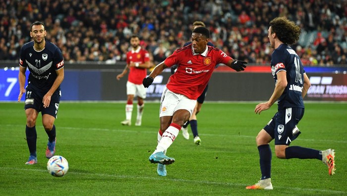 MELBOURNE, AUSTRALIA - JULY 15: Anthony Martial of Manchester United scores a goal in the first half during the Pre-Season friendly match between Melbourne Victory and Manchester United at Melbourne Cricket Ground on July 15, 2022 in Melbourne, Australia. (Photo by Vince Caligiuri/Getty Images)