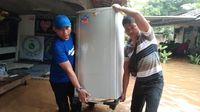 Bahu Membahu Bantu Korban Banjir di Tangsel