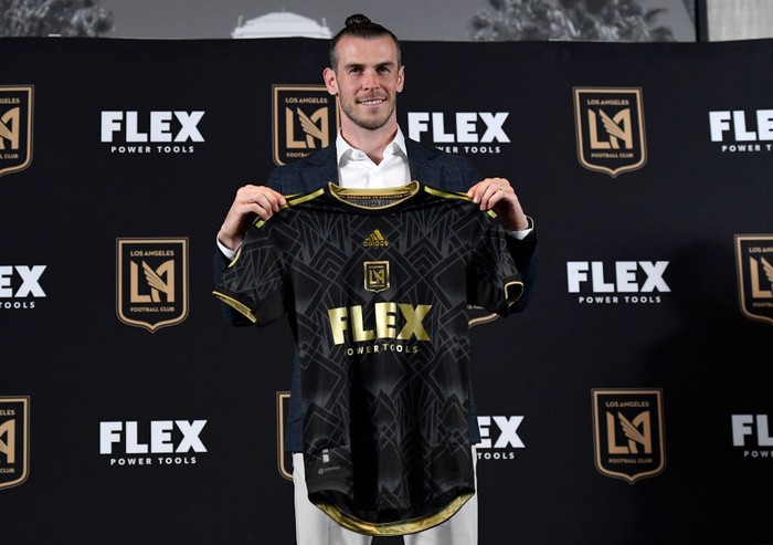 LOS ANGELES, CA - JULY 11: Forward Gareth Bale holds the Los Angeles Football Club jersey during a news conference after he was introduced at Banc of California Stadium on July 11, 2022 in Los Angeles, California. (Photo by Kevork Djansezian/Getty Images)