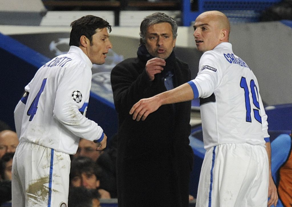 Inter Milan manager Jose Mourinho (centre) instructs his players Javier Zanetti (left) and Esteban Cambiasso (right) from the touchline during the match.   (Photo by Rebecca Naden/PA Images via Getty Images)