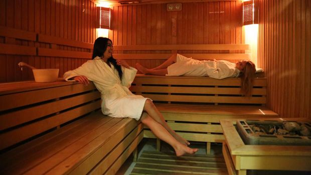 Ilustrasi perempuan mengunjungi sauna