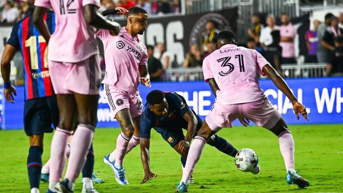 FC Barcelona's forward Ansu Fati (C) celebrates with teammates after scoring a goal during a friendly match between Inter Miami and FC Barcelona at the DRV PNK Stadium in Fort Lauderdale, on July 19, 2022. (Photo by CHANDAN KHANNA / AFP) (Photo by CHANDAN KHANNA/AFP via Getty Images)