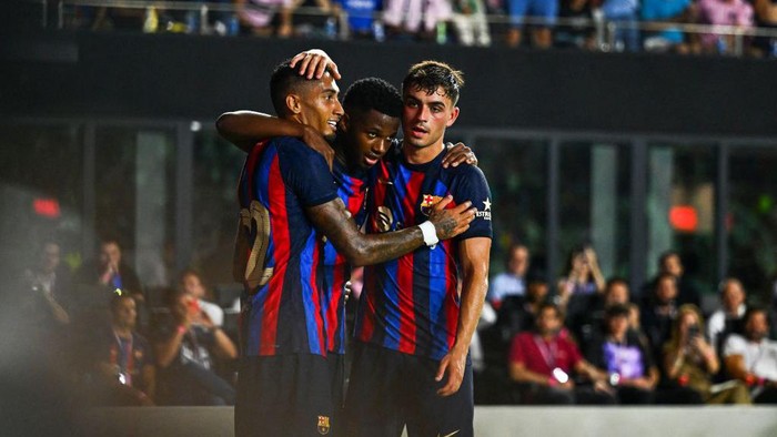 FC Barcelonas forward Ansu Fati (C) celebrates with teammates after scoring a goal during a friendly match between Inter Miami and FC Barcelona at the DRV PNK Stadium in Fort Lauderdale, on July 19, 2022. (Photo by CHANDAN KHANNA / AFP) (Photo by CHANDAN KHANNA/AFP via Getty Images)