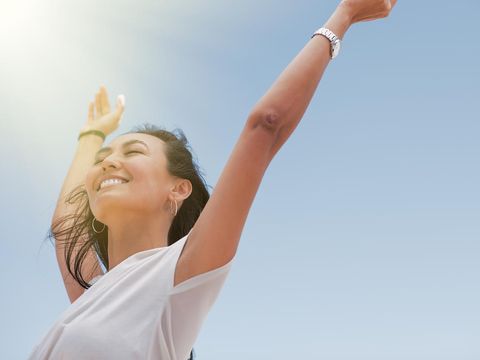 Asian beautiful woman enjoying the sun.