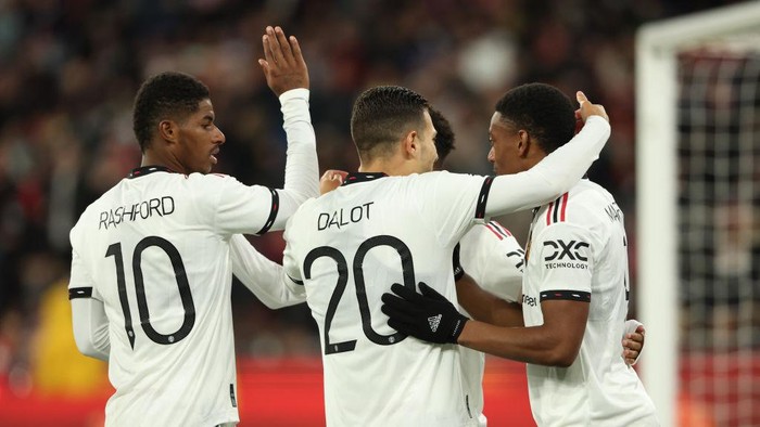 MELBOURNE, AUSTRALIA - JULY 19: Marcus Rashford of Manchester United celebrates after scoring a goal to make it 2-0 during the Pre-Season Friendly match between Manchester United and Crystal Palace at Melbourne Cricket Ground on July 19, 2022 in Melbourne, Australia. (Photo by Matthew Ashton - AMA/Getty Images)