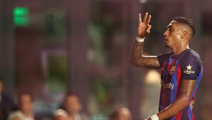 FORT LAUDERDALE, FL - JULY 19: Raphinha of FC Barcelona celebrates after scoring a goal to make it 0-2 during the pre season friendly between Inter Miami and FC Barcelona at DRV PNK Stadium on July 19, 2022 in Fort Lauderdale, Florida. (Photo by James Williamson - AMA/Getty Images)