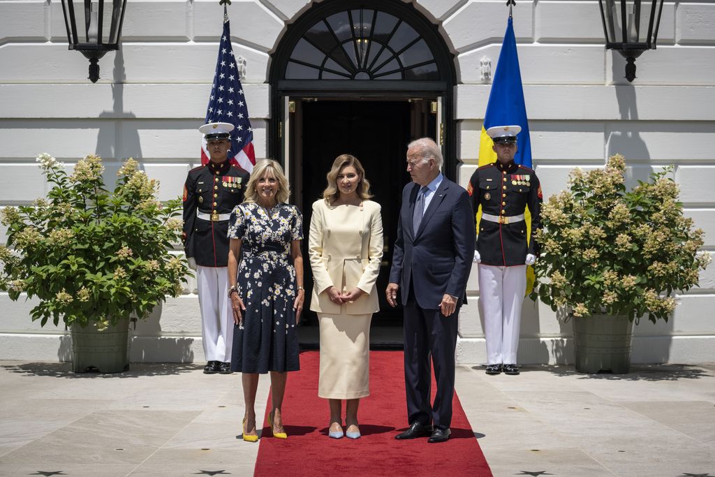 WASHINGTON, DC - JULY 19: (L-R) U.S. first lady Jill Biden, first lady of Ukraine Olena Zelenska and U.S. President Joe Biden pose for photos as Zelenska arrives on the South Lawn of the White House July 19, 2022 in Washington, DC. Zelenska is in the United States for a series of high-level meetings and an address to Congress. (Photo by Drew Angerer/Getty Images)