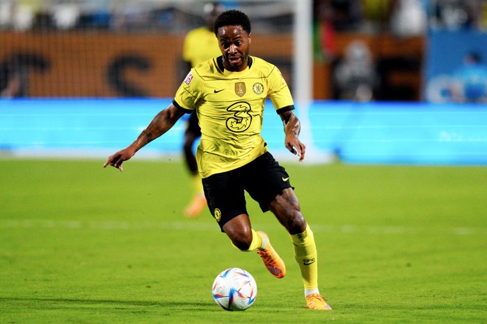 CHARLOTTE, NORTH CAROLINA - JULY 20: Raheem Sterling of Chelsea runs with the ball during the Pre-Season Friendly match between Chelsea FC and Charlotte FC at Bank of America Stadium on July 20, 2022 in Charlotte, North Carolina. (Photo by Jacob Kupferman/Getty Images)