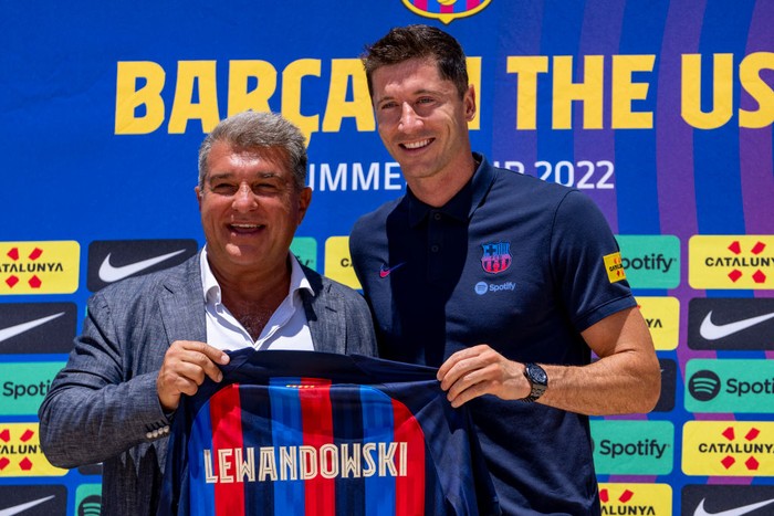 FORT LAUDERDALE, FL - JULY 20: Robert Lewandowski and Joan Laporta hold up an FC Barcelona jersey during the press conference introducing him to FC Barcelona at Conrad Fort Lauderdale Beach on July 20, 2022 in Fort Lauderdale, Florida. (Photo by Eric Espada/Getty Images)