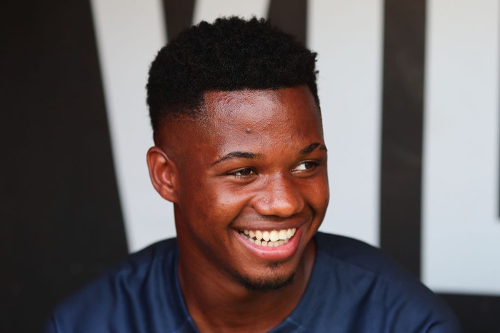OLOT, SPAIN - JULY 13: Ansu Fati of FC Barcelona looks on prior to the pre-season friendly match between UE Olot and FC Barcelona at Nou Estadi Municipal on July 13, 2022 in Olot, Spain. (Photo by Eric Alonso/Getty Images)