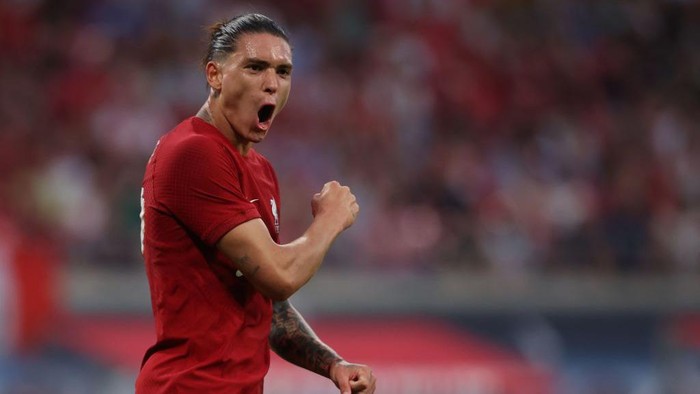 Liverpools Uruguayan forward Darwin Nunez celebrates scoring his teams fifth goal during the friendly football match between German first division Bundesliga club RB Leipzig and Liverpool FC in Leipzig, eastern Germany, on July 21, 2022. (Photo by Ronny HARTMANN / AFP) (Photo by RONNY HARTMANN/AFP via Getty Images)