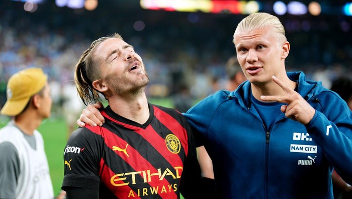 HOUSTON, TEXAS - JULY 20: Jack Grealish and Erling Haaland of Manchester City react after the Pre-Season friendly match between Manchester City and Club America at NRG Stadium on July 20, 2022 in Houston, Texas. (Photo by Tom Flathers/Manchester City FC via Getty Images)