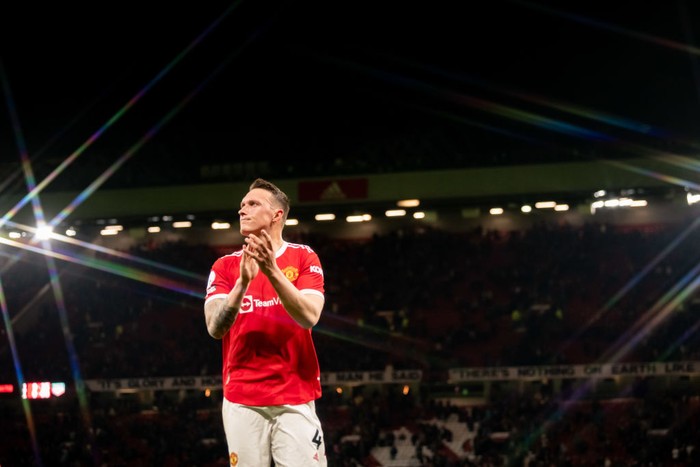 MANCHESTER, ENGLAND - APRIL 28:  Phil Jones of Manchester United applauds at the end of the Premier League match between Manchester United and Chelsea at Old Trafford on April 28, 2022 in Manchester, United Kingdom. (Photo by Ash Donelon/Manchester United via Getty Images)