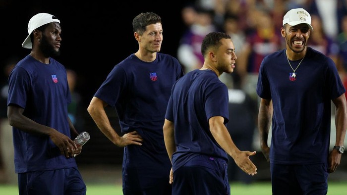 FORT LAUDERDALE, FLORIDA - JULY 19: (L-R) Franck Kessie, Robert Lewandowski, Sergino Dest and Pierre-Emerick Aubameyang of FC Barcelona react after a preseason friendly against Inter Miami CF at DRV PNK Stadium on July 19, 2022 in Fort Lauderdale, Florida. FC Barcelona won 6-0. (Photo by Michael Reaves/Getty Images)