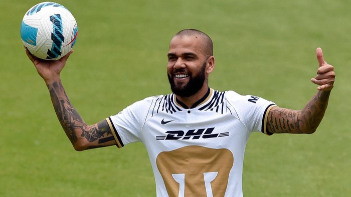 Brazilian international football star Dani Alves gestures during his presentation to the media after signing his contract for the current Apertura-2022 tournament, at the team instalations in the National Autonomous University of Mexico, in Mexico City on July 23, 2022. (Photo by ALFREDO ESTRELLA / AFP) (Photo by ALFREDO ESTRELLA/AFP via Getty Images)