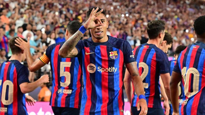 Barcelonas Raphinha gestures after scoring a goal during the international friendly football match between Barcelona and Real Madrid at Allegiant Stadium in Las Vegas, Nevada, on July 23, 2022. (Photo by Frederic J. BROWN / AFP) (Photo by FREDERIC J. BROWN/AFP via Getty Images)