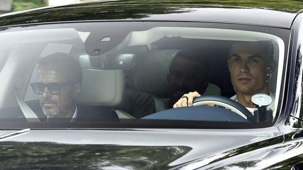 Manchester United's Cristiano Ronaldo arrives at Carrington Training Ground, Manchester, England, Tuesday July 26, 2022. (Peter Powell/PA via AP)