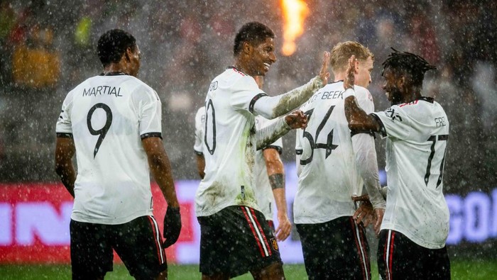PERTH, AUSTRALIA - JULY 23:    Marcus Rashford of Manchester United celebrates the second goal  with Fred during the Pre-Season Friendly match between Manchester United and Aston Villa at Optus Stadium on July 23, 2022 in Perth, Australia. (Photo by Ash Donelon/Manchester United via Getty Images)