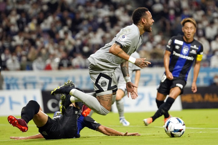 Neymar, Gamba Osaka Paris Saint-Germain's Neymar and Gamba Osaka's Genta Miura collide during a friendly soccer match in Suita, western Japan, Monday, July 25, 2022. (AP Photo/Hiro Komae)