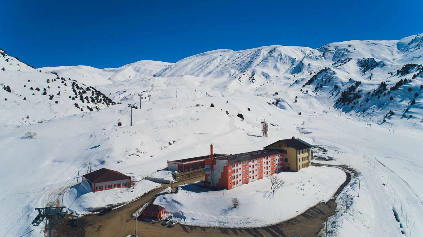 Vahdat district beautiful view from the aircraft to the mountains in Tashkent, china and Kirgistan, covered with snow