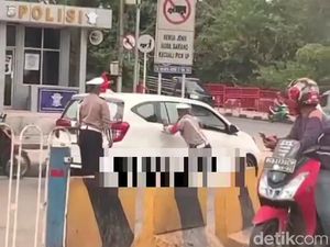 Polisi Buru Pengendara yang Nyaris Seret Polantas di Palembang Polisi Buru Pengendara yang Nyaris Seret Polantas di Palembang