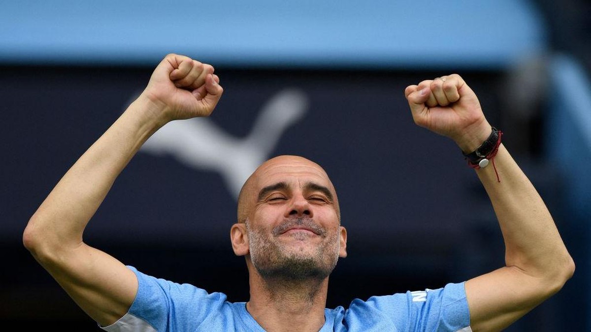 Pep Guadiola mempunyai rekor bagus melawan Manchester United. (Foto: AFP via Getty Images/OLI SCARFF)
