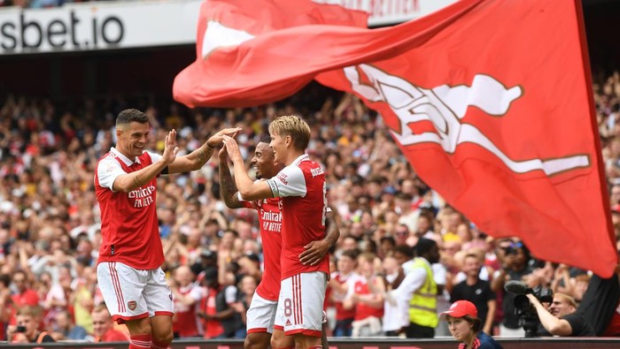 LONDON, ENGLAND - JULY 30: (2ndR) Gabriel Jesus celebrates scoring the 3rd Arsenal goal with (L) Granit Xhaka and (R) Martin Odegaard during the Emirates Cup match between Arsenal and Seville at Emirates Stadium on July 30, 2022 in London, England. (Photo by Stuart MacFarlane/Arsenal FC via Getty Images)