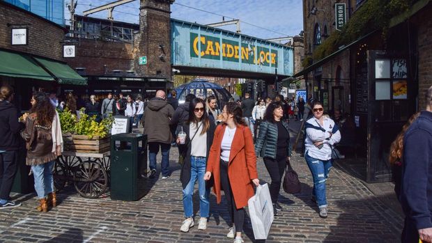London, United Kingdom - April 18 2021: Busy Camden Market and Camden Lock on a clear day.