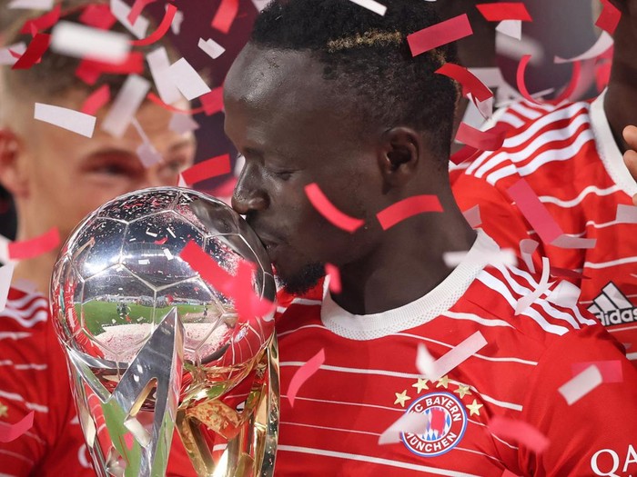 LEIPZIG, GERMANY - JULY 30: Sadio Mane of Bayern Muenchen with the Supercup after the Supercup 2022 match between RB Leipzig and FC Bayern München at Red Bull Arena on July 30, 2022 in Leipzig, Germany. (Photo by Stefan Matzke - sampics/Corbis via Getty Images)