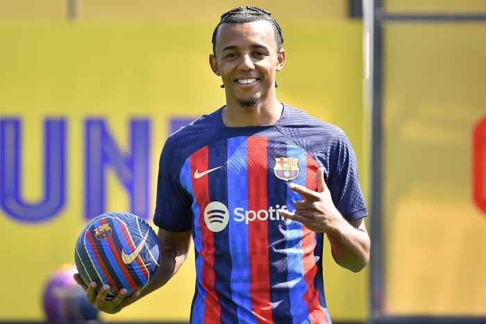 Jules Kounde FC Barcelona's new french defender Jules Kounde poses for pictures during his presentation ceremony at the Joan Gamper training ground in Sant Joan Despi, near Barcelona, on August 1, 2022. (Photo by Pau BARRENA / AFP) (Photo by PAU BARRENA/AFP via Getty Images)