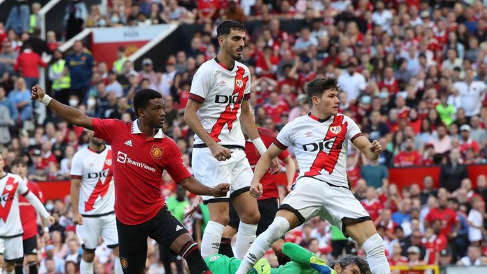 MANCHESTER, ENGLAND - JULY 31: Amad of Manchester United scores their first goal during the pre-season friendly match between Manchester United and Rayo Vallecano at Old Trafford on July 31, 2022 in Manchester, England. (Photo by Tom Purslow/Manchester United via Getty Images)
