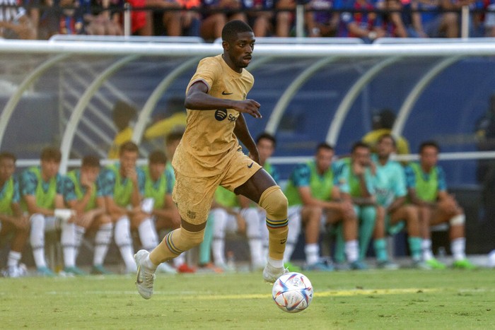 Ousmane Dembele Barcelona forward Ousmane Dembélé dribbles the ball during the first half of a soccer match against Juventus at the Cotton Bowl, Tuesday, July 26, 2022 in Dallas. The game ended in a 2-2 draw. (AP Photo/Jeffrey McWhorter)